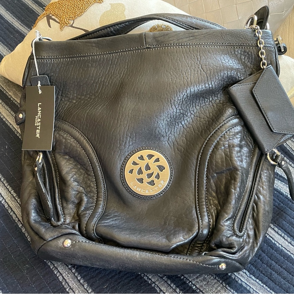 Lancaster (Made in France) black leather shoulder bag.